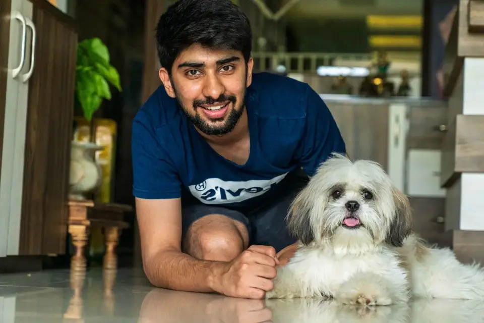 Dog owner at home