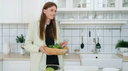 Dog owner preparing a meal